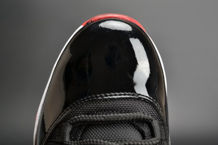 air jordan 11 retro low "bred" black/ red mens 528895-012